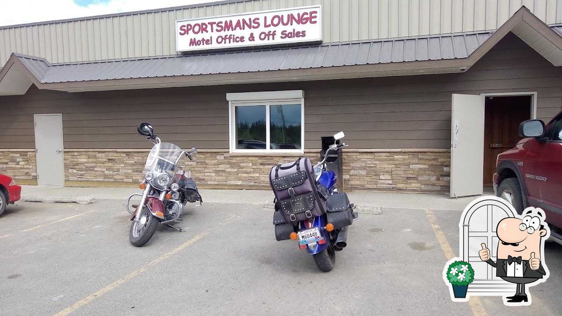 dining chairs and table and pool table at the back